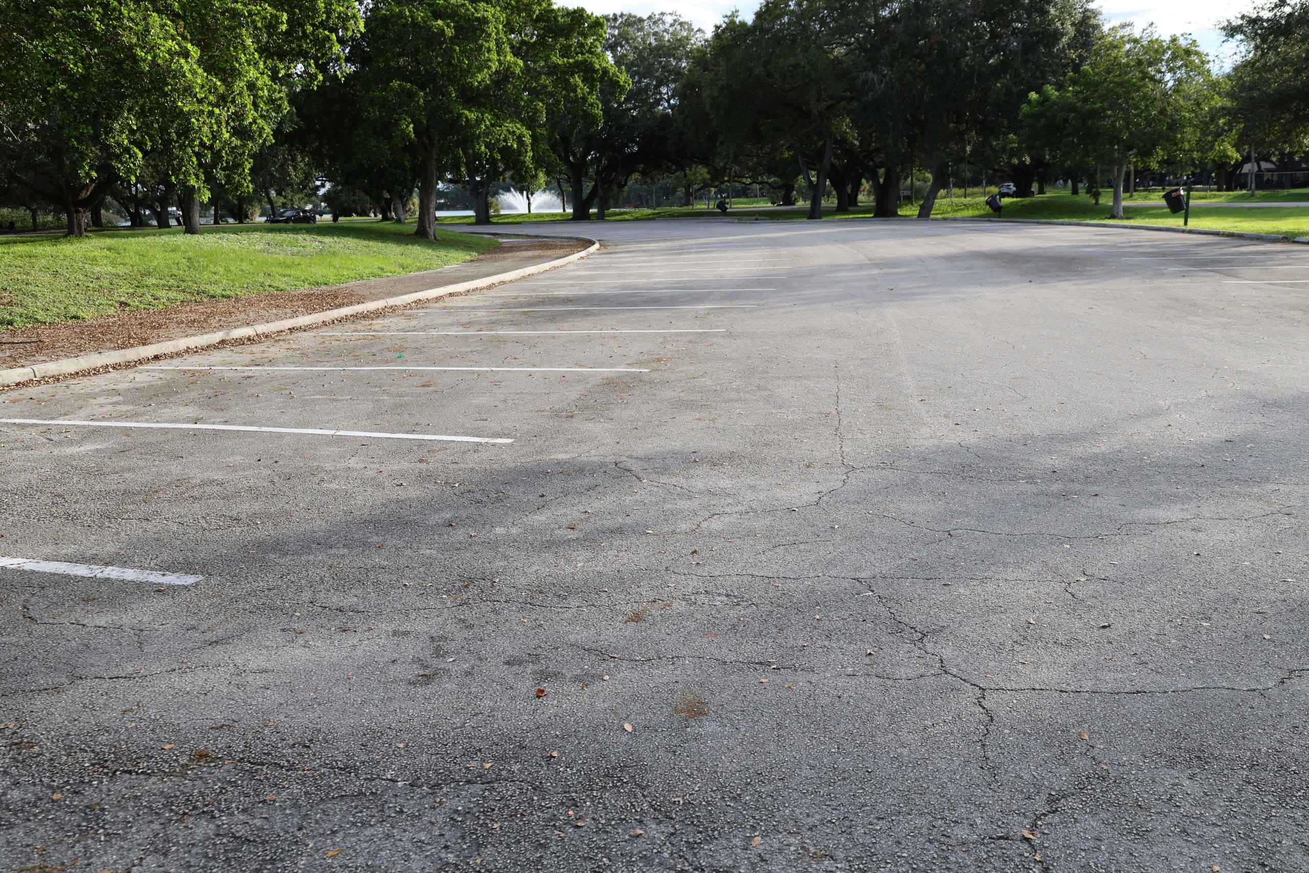 Large empty parking lot on park 5 Signs Your Parking Lot Needs Maintenance ASAP (And How to Fix It)
